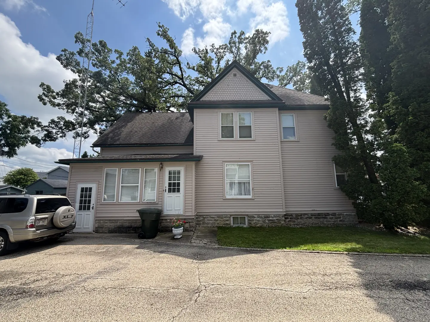 Two-story, mauve to navy, before