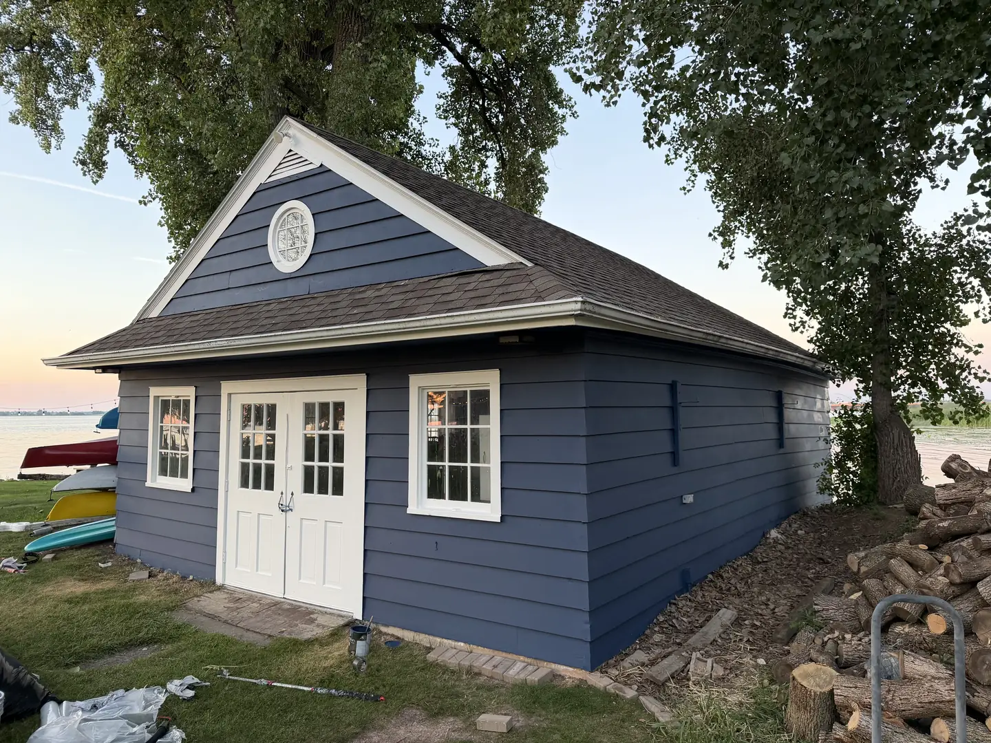 The same boathouse from the water side, after